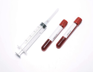 test tubes with blood injection syringe