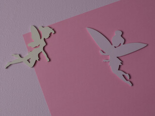 Top view flatlay lie concept view of little small Fairy, color background angel, background for...