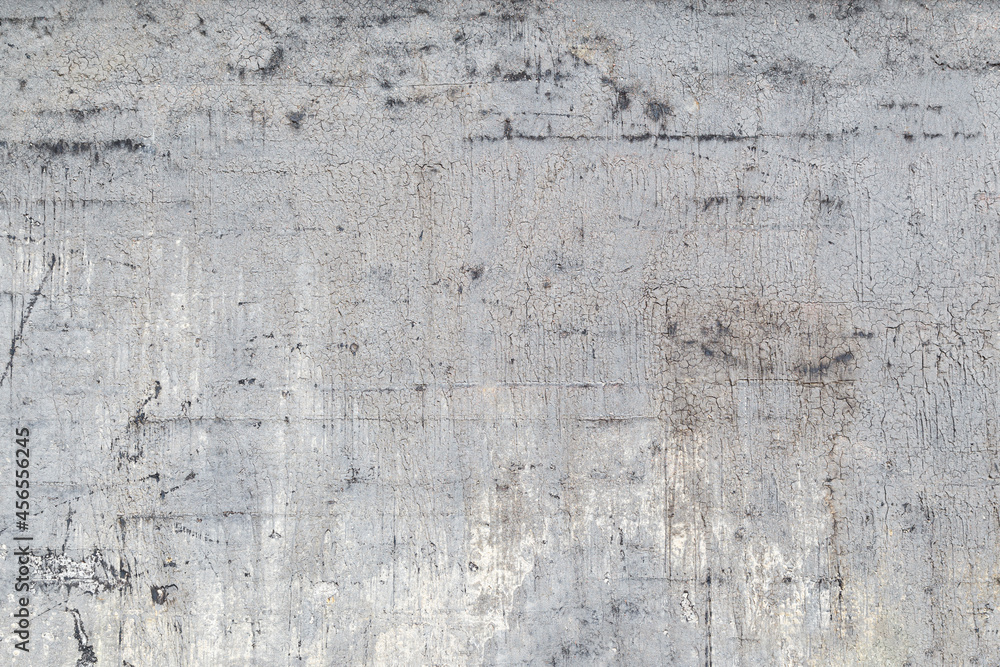 Poster front view of dirty and weathered wall with cracked plastering and paint. high resolution full frame