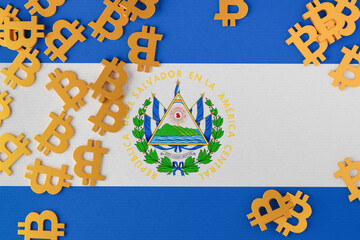 El Salvador flag with Bitcoin icons above - obrazy, fototapety, plakaty