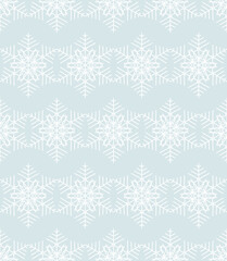 Seamless Christmas pattern. White lace made of snowflakes