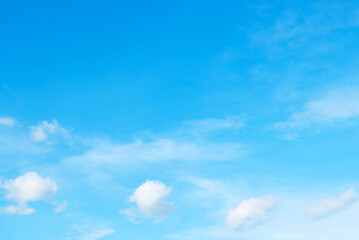 Clean blue sky and white clouds sky background with space for decoration. And used to make wallpaper or bring to work in graphic design..
