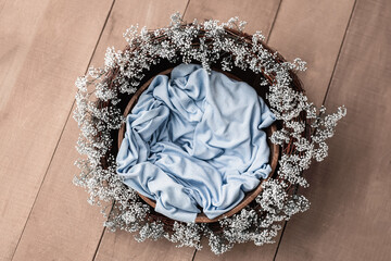 Newborn Digital Background winter flowers Basket Prop for Newborn. For boys and girls. Wood back. shoot set up with prop bed and wood backdrop. Unisex pastel grey monochrome decoration. gender neutral - obrazy, fototapety, plakaty