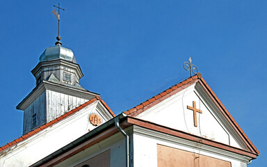 General view and architectural details of the Catholic church built in 1873 with the belfry under...