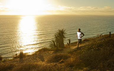 Man running on dirt path