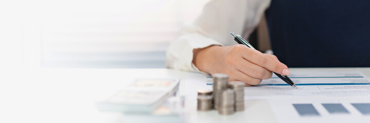 Business Professional Chartered Accountant Woman working with computer and calculator Sales Invoice Accounting.