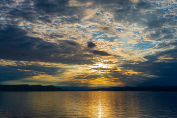Obraz premium Beautiful view in sunset over Adriatic sea with dramatic sky, Croatia, Europe