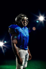 Portrait of american football player © Image Source Limited