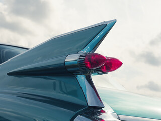 Taillight of an old vintage car on a sunny day