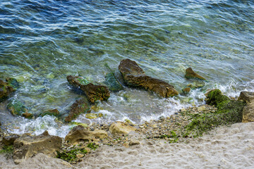 Beautiful Sea Landscape with Waves Breaking on a Sandy and Rocky Beach. Waves on Background. Summer time in Ravda, Bulgaria