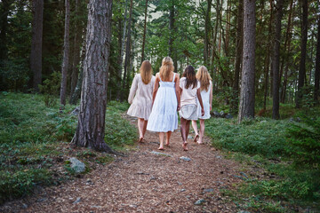 Teenage girls on forest track
