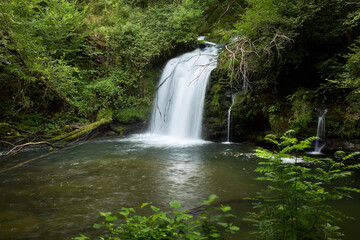 Fototapeta na wymiar Beautiful waterfall hidden in a remote part of Galicia, Spain.