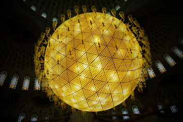 Close view of the globe chandelier inside the mosque.