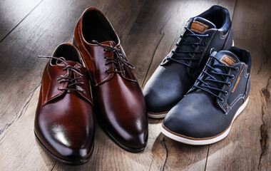 Composition with two pairs of men's shoes