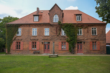 Fototapeta na wymiar Brick building, today used as museum in the historic fortress of Domitz on the river Elbe in northern Germany, Europe
