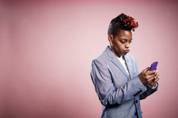 Portrait of young woman using smartphone