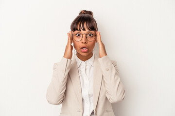 Young mixed race woman isolated on white background  receiving a pleasant surprise, excited and raising hands.