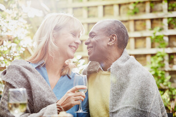 Couple drinking wine in garden