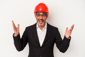 Middle age architect caucasian man isolated on white background  receiving a pleasant surprise,...