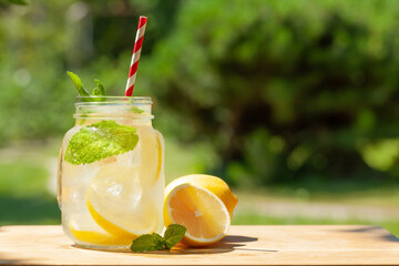 Fresh homemade lemonade with lemon and mint
