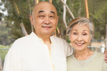 Portrait of senior couple, smiling