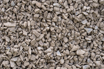 The texture of dirty rubble. Background of small stone covered with mud