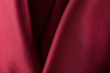 neoprene fabric in bright burgundy color, folded