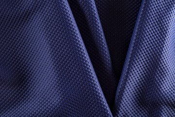dark blue neoprene fabric folded