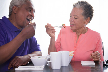 Senior couple having breakfast together