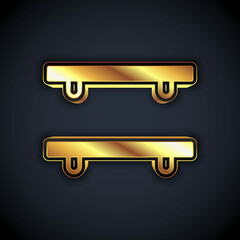 Gold Empty wooden shelves icon isolated on black background. Vector