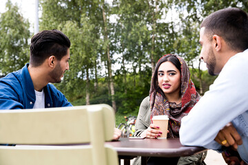 Friends enjoying coffee together