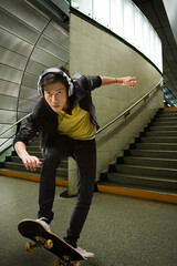 A young man skateboarding © Image Source Limited