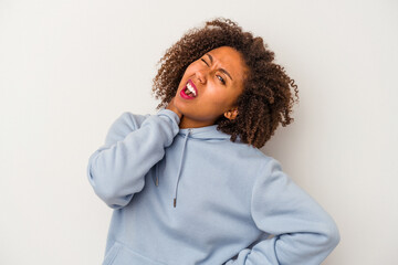 Young african american woman with curly hair isolated on white background suffering neck pain due to sedentary lifestyle.