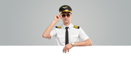 Serious pilot with blank placard © kegfire