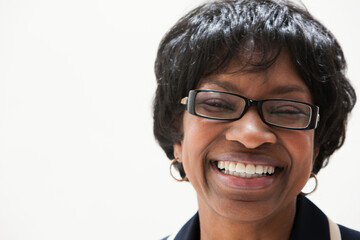 Fototapeta premium Portrait of mature African American businesswoman, studio shot