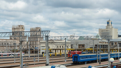 View of city industrial area with railway hub. Freight trains for cargo transportation.