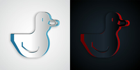 Paper cut Rubber duck icon isolated on grey and black background. Paper art style. Vector