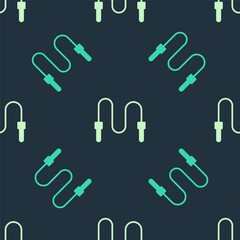 Green and beige Jump rope icon isolated seamless pattern on blue background. Skipping rope. Sport equipment. Vector