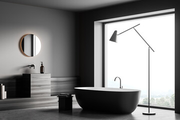 Naklejka na ściany i meble Corner view on dark bathroom interior with bathtub