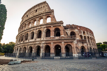 Fototapeta na wymiar Sunrise at the Colosseum in Rome. Years of history in the eternal city. Roman Empire