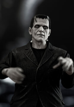 NEW YORK USA - SEPT 15, 2021: Frankenstein monster lurking in a castle dungeon - NECA Ultimate black and white figure