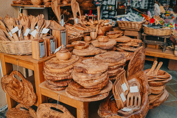 Products made from olive tree, wooden souvenirs on sale in Greece island - Corfu. Local market with...