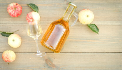 A glass of organic homemade apple wine,cider in the harvest season. Natural alcohol, farming and agriculture concept
