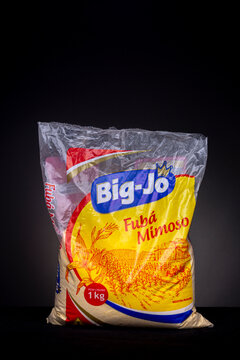 Rio de Janeiro, Brazil - April 23, 2020: Pack of yellow cornmeal of Brazilian brand Big-Jo fub&aacute;. Studio low key product still life against a dark grey background.