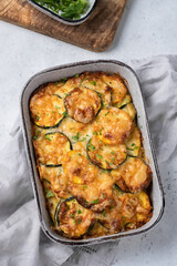 casserole with zucchini squash and cheese in baking dish