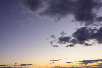 Dark lilac sky and clouds at sunset.