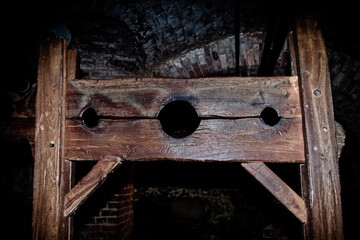 Pads prison in the dark brick basement of a medieval castle