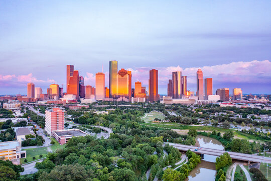 Houston, Texas. Sunset view of Houston Downtown Skyscrapers , showing the bayou and  downtown parks.