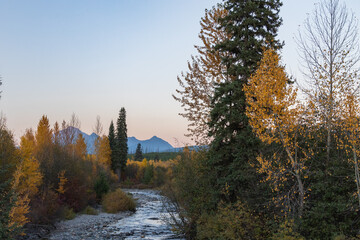 North Fork Flathead River and colorful Fall foliage, Glacier National Park, Montana, USA