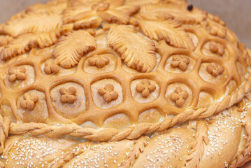 Beautiful bread with patterns and ornaments.